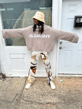 Load image into Gallery viewer, Tan “Floral faces” denim
