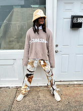 Load image into Gallery viewer, Tan “Floral faces” denim

